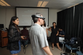 Professor Topher Maraffi testing the Mitchelville project on the Magic Leap Headset with graduate student Ledis Molina at Research Encounter 2020.